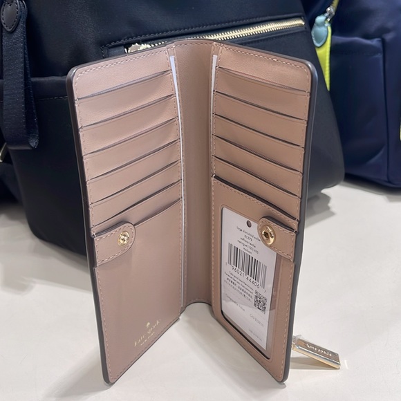 Kate Spade Madison Large Slim Bifold Wallet
Meringue 
NWT - Picture 7 of 16